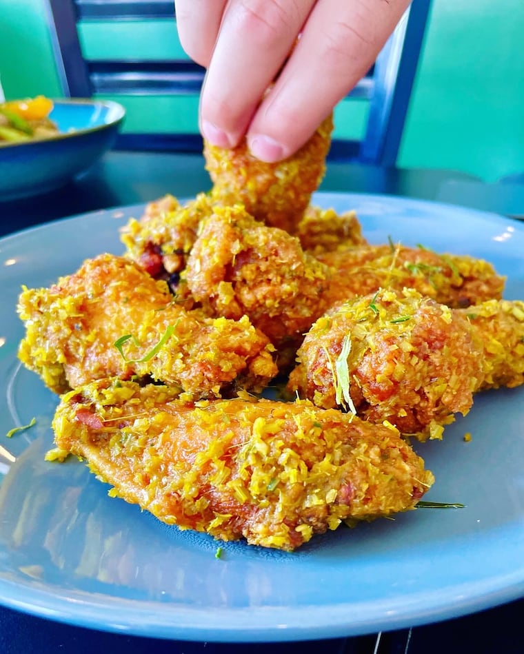 Chicken wings coated in Cambodian lemongrass paste at Sophie's Kitchen.