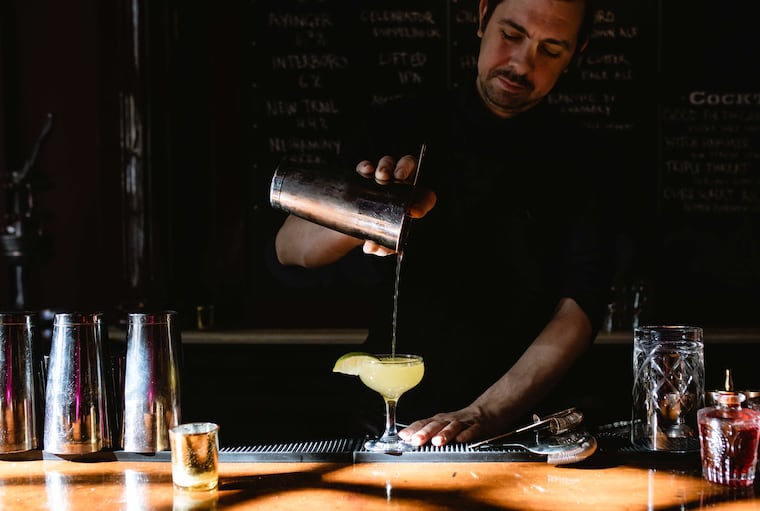 Bar manager Bohdan Darway pours a cocktail at the Hayes, a bar from chef Townsend Wentz in Washington Square West.