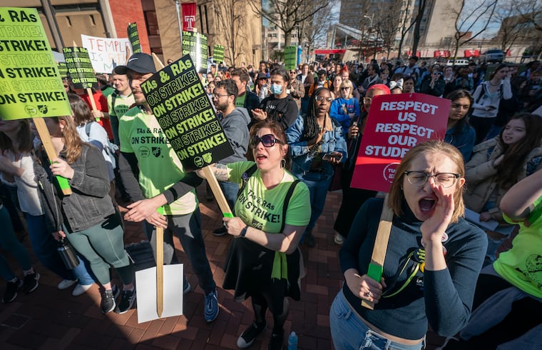 Ariel Natalo-Lifton (front center) and Laura Waters (front right), TUGSA vice president, protest at Temple University where students walked out of class on Wednesday, Feb. 15, 2023, in Philadelphia, in support of the teaching assistants and research assistants, some of whom are on strike.