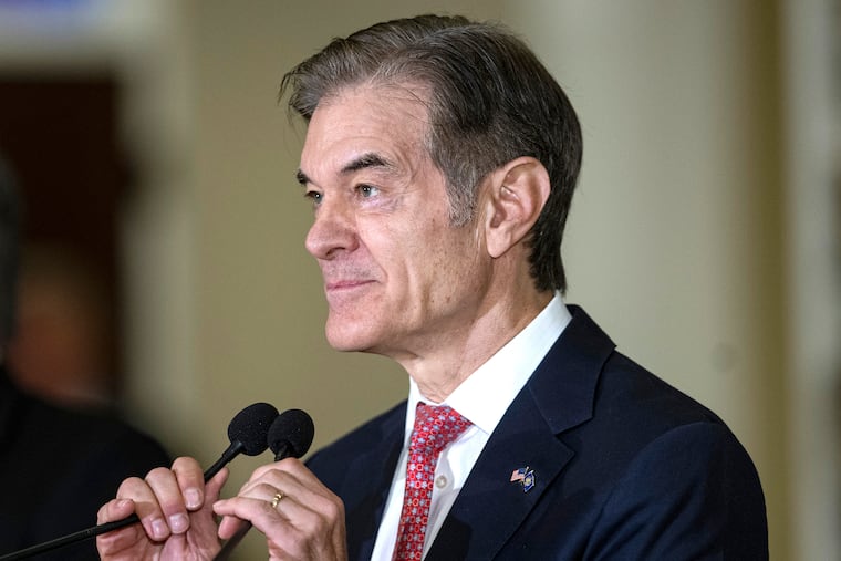 Mehmet Oz talks to the media after accepting an endorsement from the Fraternal Order of Police on Sept. 26, 2022.