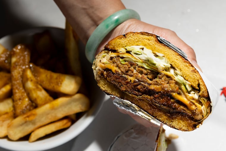 The Ramly Burger with chips and curry at Kampar in Philadelphia on Thursday, July 11, 2024. Kampar is located at 611 South 7th Street.