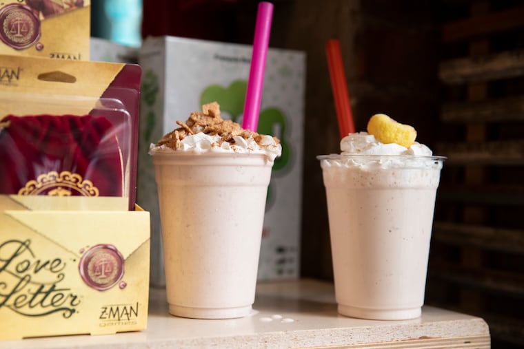 Cinnamon Toast milkshake (left) and the Georgia Peach Iced Tea boozy milkshake at Thirsty Dice in Philadelphia on June 7, 2023.