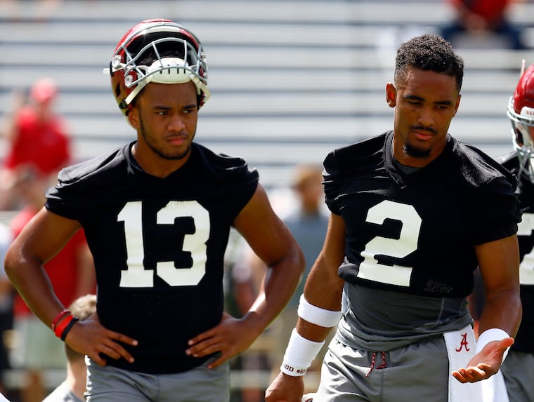 Jalen Hurts (2) and Tua Tagovailoa (13) go back to their Alabama days.