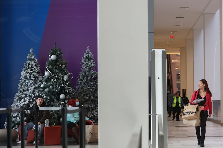 Shoppers can be seen inside the Fashion District by 9th and Filbert St. in Philadelphia on Black Friday, Nov. 24, 2023.