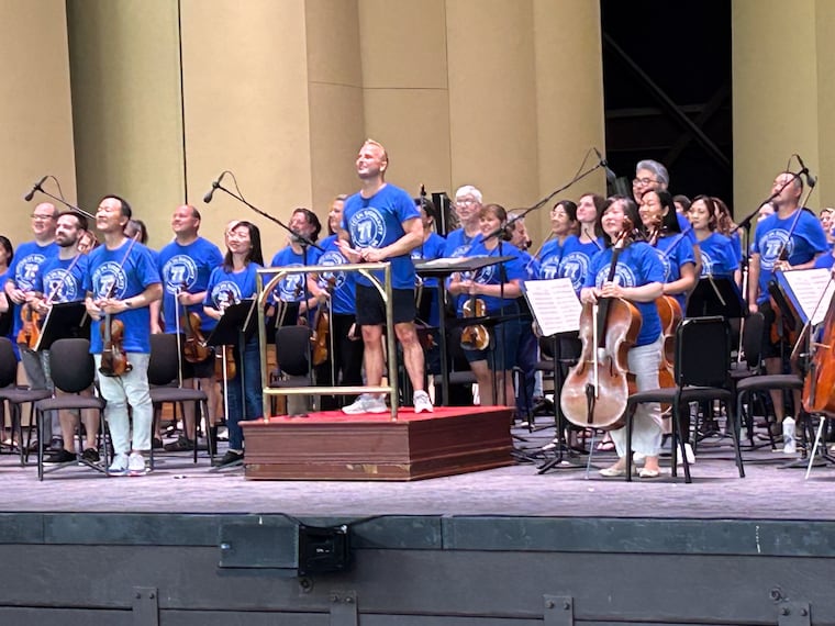 Philadelphia Orchestra music and artistic director Yannick Nézet-Séguin wears a blue musicians' union T-shirt in solidarity with his orchestra members Aug. 11, 2023, during an open rehearsal in Saratoga Springs, N.Y. The musicians, represented by Local 77 of the American Federation of Musicians, are in negotiations for a new contract with the Philadelphia Orchestra and Kimmel Center Inc.