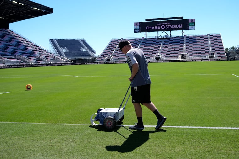 A grounds crew worker at Chase Stadium earlier this year.