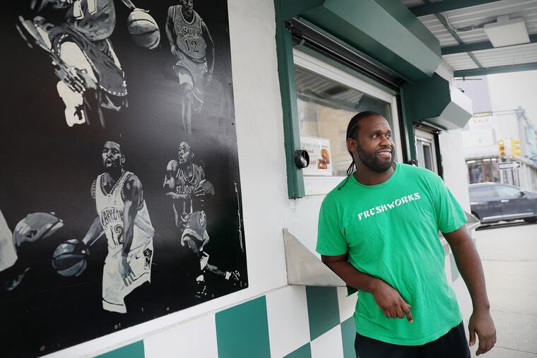 Former St. Joseph's basketball player Marvin O'Connor at the Fresh Works shop he co-owns in Philadelphia's Point Breeze section.