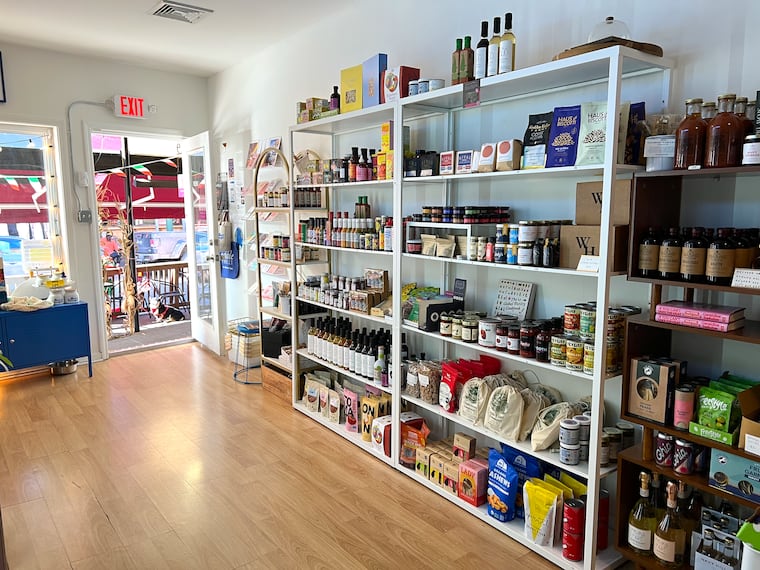 Shelves filled with local products at Salt & Vinegar's store in the Italian Market.