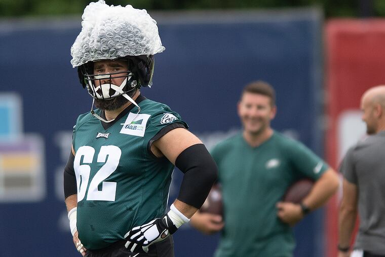 Eagles center Jason Kelce wears Bubble Wrap over his protective helmet cover and helmet at training camp on July 29, 2022.