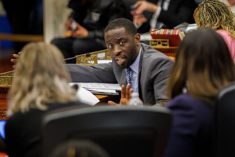 Philadelphia City Councilmember Isaiah Thomas questions members of the Parker administration during a hearing about the proposed Sixers arena in November.